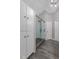 Bathroom showcasing a stand alone shower with seamless glass and decorative wall tiles at 140 Surrey Park Dr, Fayetteville, GA 30215
