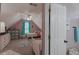 Attic bedroom with sloped ceiling and ample natural light coming from the window at 140 Surrey Park Dr, Fayetteville, GA 30215