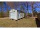 Well-maintained shed offers ample storage space and enhances the functionality of the backyard at 140 Surrey Park Dr, Fayetteville, GA 30215
