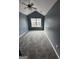 Well-lit bedroom with neutral walls and a large window for natural light at 2747 Vining Ridge Ter, Decatur, GA 30034