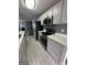 Modern kitchen with stainless steel appliances and bright white countertops at 2747 Vining Ridge Ter, Decatur, GA 30034