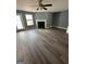 Spacious living room with fireplace and new floors, ideal for entertaining at 2747 Vining Ridge Ter, Decatur, GA 30034