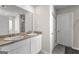 Bathroom features dual sinks and nearby toilet and shower in this home at 1756 Beckworth Ln, Hampton, GA 30228