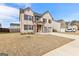 Attractive two-story house featuring a brick front, an attached two-car garage, and well-maintained landscaping at 1756 Beckworth Ln, Hampton, GA 30228