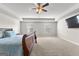 Spacious main bedroom with tray ceilings, ceiling fan, and lots of natural light at 1756 Beckworth Ln, Hampton, GA 30228
