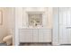 Bright bathroom featuring double vanity, ample storage, and modern finishes for convenience at 988 Sutherland Lane # 33, Lawrenceville, GA 30043
