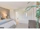 Inviting bedroom with a plush bed, stylish decor, and plenty of natural light for comfort at 988 Sutherland Lane # 33, Lawrenceville, GA 30043