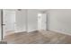 Well-lit bedroom with two closets and light hardwood floors at 510 River Run Dr, Atlanta, GA 30350