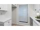 Bright kitchen featuring white cabinets, stainless steel appliances, and quartz countertops at 510 River Run Dr, Atlanta, GA 30350