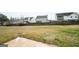 Expansive grassy backyard with wood fencing, showcasing the property's outdoor space and potential at 6517 Snowbird Ln, Douglasville, GA 30134
