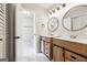 Dual sink bathroom with rustic vanities at 1015 Chapman Ln, Stone Mountain, GA 30088