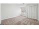 Neutral bedroom with carpet and large closet at 1015 Chapman Ln, Stone Mountain, GA 30088