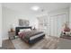 Neutral bedroom with a comfortable bed, stylish decor, and ample natural light at 1015 Chapman Ln, Stone Mountain, GA 30088