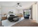 Bright bedroom featuring a king-sized bed, modern furnishings, and access to outdoor space at 1015 Chapman Ln, Stone Mountain, GA 30088