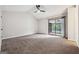 Open bedroom featuring sliding glass doors at 1015 Chapman Ln, Stone Mountain, GA 30088