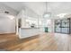 Large open kitchen with all-white cabinets, modern backsplash, and stainless steel appliances at 1015 Chapman Ln, Stone Mountain, GA 30088