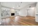 Spacious living area with hardwood floors, windows, and direct access to the entry and kitchen at 1015 Chapman Ln, Stone Mountain, GA 30088