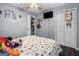 Cozy bedroom with ceiling fan, ensuite bath, and closet at 916 Marshall Fuller Rd, Dallas, GA 30157