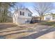 Charming two-story home with a welcoming front porch and attached garage at 916 Marshall Fuller Rd, Dallas, GA 30157