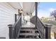 Inviting front porch with railings and steps at 916 Marshall Fuller Rd, Dallas, GA 30157