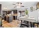 Modern kitchen featuring dark wood cabinets, stainless steel appliances, and a central island at 916 Marshall Fuller Rd, Dallas, GA 30157