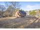 A shed with a blue roof at 916 Marshall Fuller Rd, Dallas, GA 30157