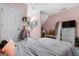 Pink room with comfortable bed and a cozy ambiance perfect for creative play and restful nights at 9209 W Banks Mill Rd, Winston, GA 30187