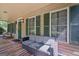 Inviting front porch featuring comfortable seating, providing a cozy outdoor living space at 9209 W Banks Mill Rd, Winston, GA 30187