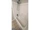 Bathroom featuring a tile floor and shower-tub combo at 9091 Woodgreen Way, Jonesboro, GA 30238