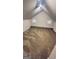 Spacious bedroom with neutral carpet, lighting, and paint at 9091 Woodgreen Way, Jonesboro, GA 30238