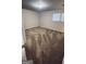 Neutral bedroom featuring carpet, a window, and lighting at 9091 Woodgreen Way, Jonesboro, GA 30238