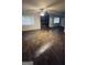 Bright living room with new floors and a stone fireplace at 9091 Woodgreen Way, Jonesboro, GA 30238