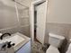 Cozy bathroom showcases a vanity with a solid surface countertop, complemented by a shower with glass doors at 365 Jordan Dr, Tucker, GA 30084