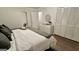 Cozy bedroom with a bed, bedside tables, and ample closet space at 365 Jordan Dr, Tucker, GA 30084