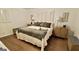 Comfortable bedroom with a bed, and bedside tables with lamps at 365 Jordan Dr, Tucker, GA 30084