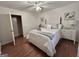 Bright bedroom with wood floors, a comfortable bed, and charming decor, enhanced by natural light at 365 Jordan Dr, Tucker, GA 30084