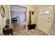 Welcoming foyer offers coat hooks, bench, and a view of the living room at 365 Jordan Dr, Tucker, GA 30084