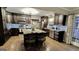 Modern kitchen with granite countertops, stainless steel appliances, and an island with seating at 365 Jordan Dr, Tucker, GA 30084