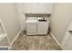 Well-organized laundry room with modern appliances and ample storage space at 365 Jordan Dr, Tucker, GA 30084