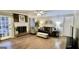 Inviting living room features a brick fireplace, hardwood floors, and comfortable seating at 365 Jordan Dr, Tucker, GA 30084
