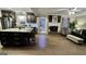 Open-concept living room with fireplace, hardwood floors, view of the kitchen, and comfortable seating at 365 Jordan Dr, Tucker, GA 30084