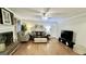 Spacious living room features a ceiling fan and hardwood flooring at 365 Jordan Dr, Tucker, GA 30084