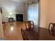 Dining room view through living room with fireplace feature at 4019 Pin Oak Trl, Decatur, GA 30034