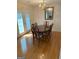 Formal dining room with hardwood floors, chandelier, and French doors at 4019 Pin Oak Trl, Decatur, GA 30034