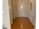 Inviting entryway with hardwood floors and traditional wainscoting at 4019 Pin Oak Trl, Decatur, GA 30034