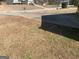 View of front yard showcasing well-manicured lawn and tree at 4019 Pin Oak Trl, Decatur, GA 30034