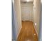 Hallway with doors leading to different rooms and a light fixture at 4019 Pin Oak Trl, Decatur, GA 30034
