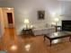 Comfortable living room features a sofa, lamps, and fireplace at 4019 Pin Oak Trl, Decatur, GA 30034