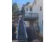 Exterior view with multi-level decks and stairs, perfect for outdoor entertainment at 718 Avalon Way, Peachtree City, GA 30269