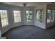 Light filled bedroom featuring plush carpet, crown molding, and windows at 718 Avalon Way, Peachtree City, GA 30269